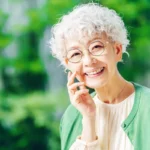 Senior citizen, Smile, Glasses, Human face, Outdoor